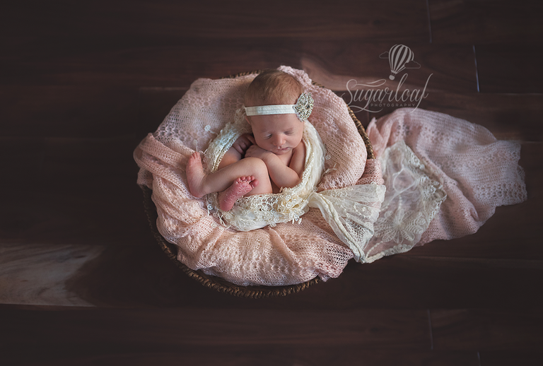 newborn girl soft pink