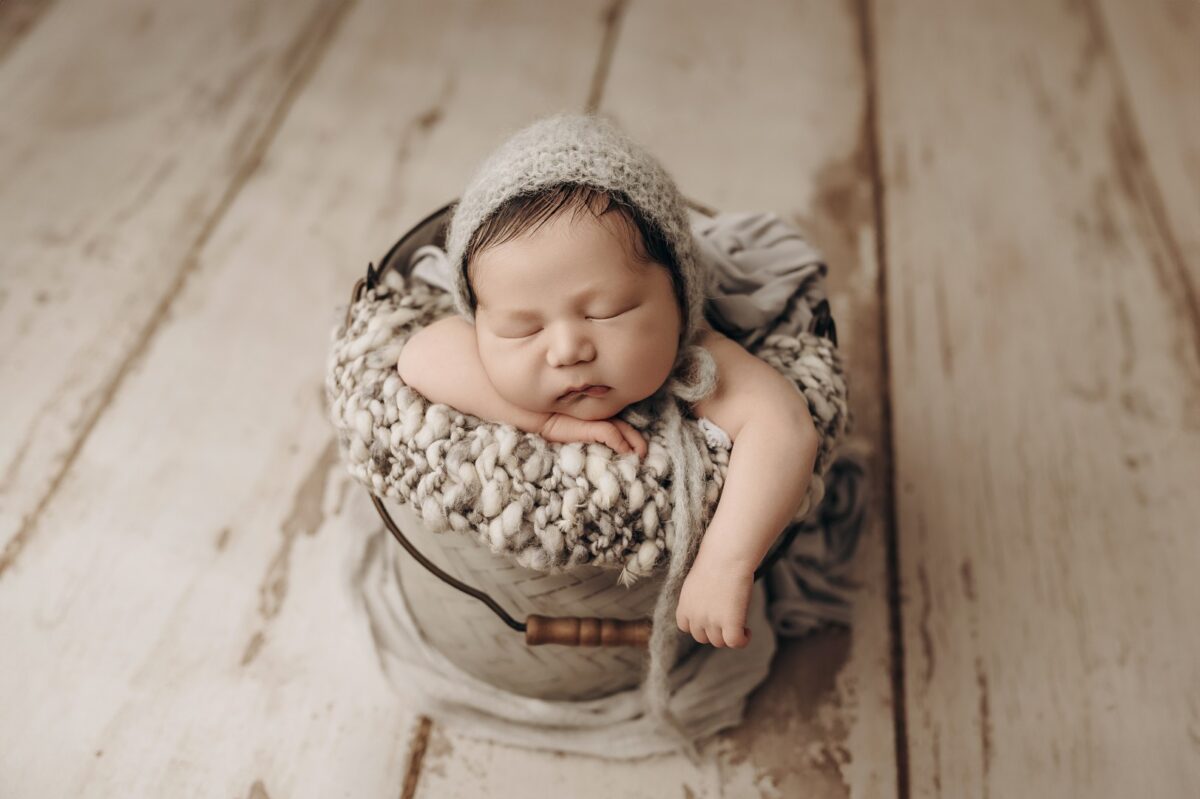 Newborn bucket pose neutral backdrop Sugarloaf Photography Harford County