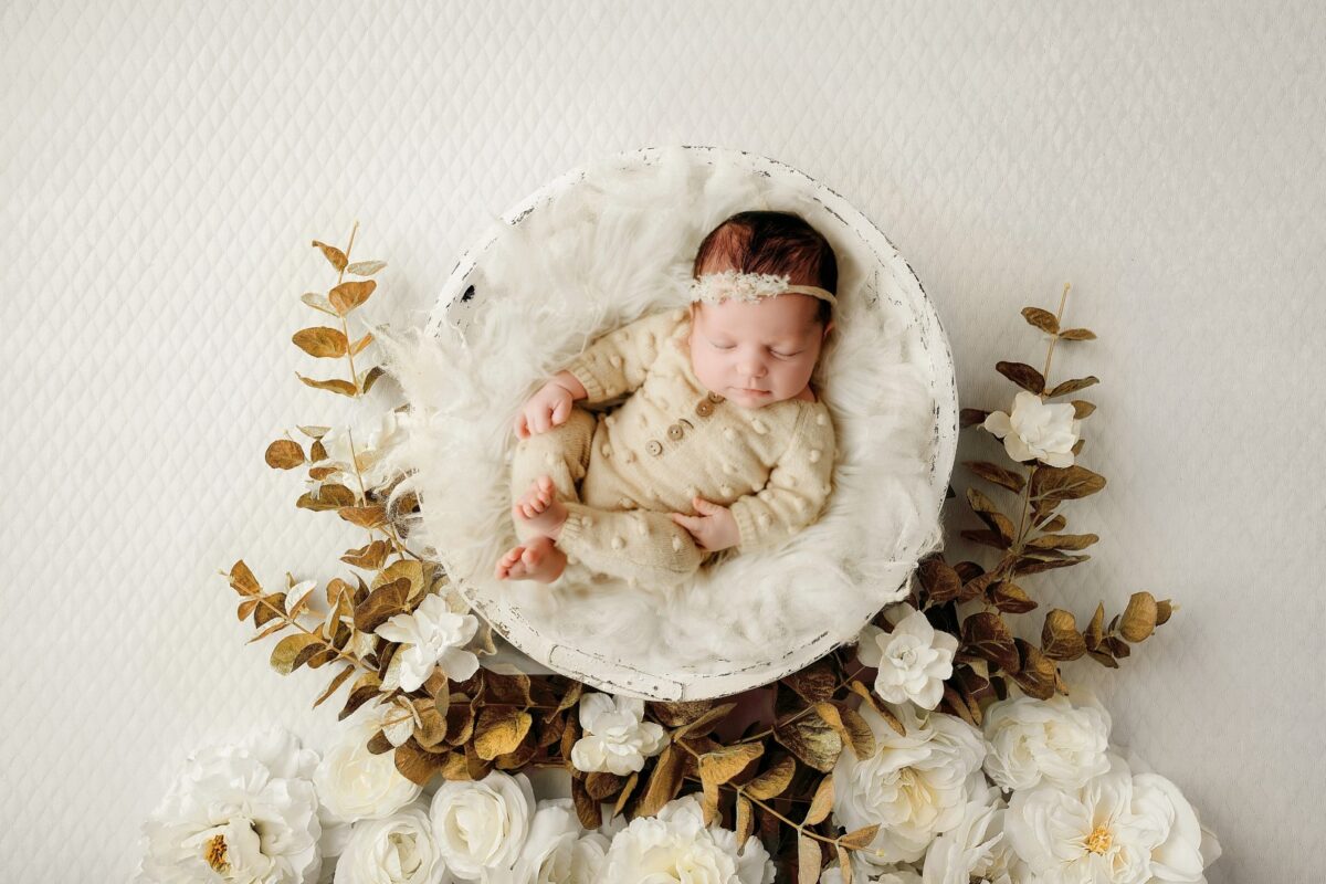 Newborn composite image baby girl floral wreath Sugarloaf Photography