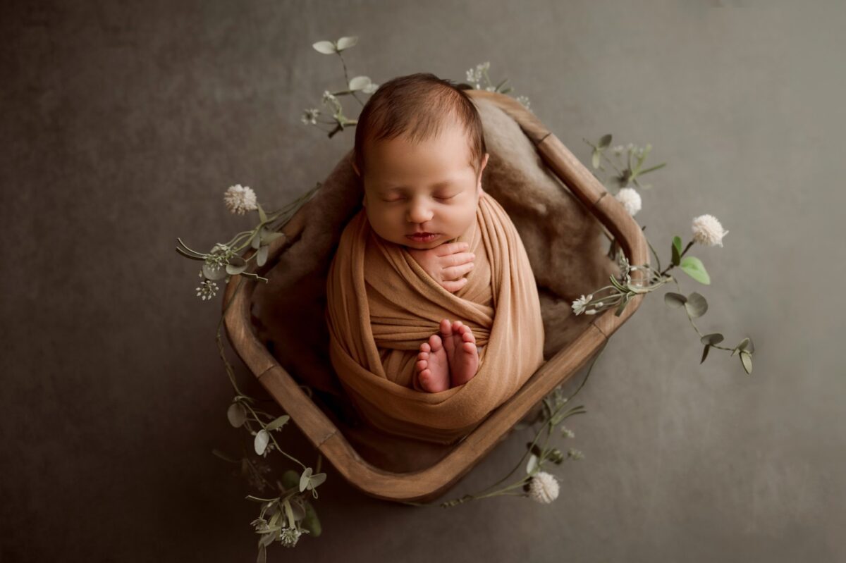 Harford County newborn photographer baby boy wrapped Bel Air studio